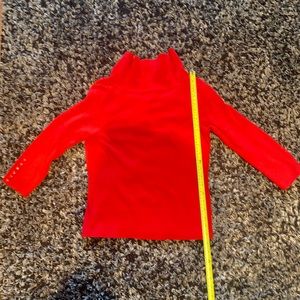 Red jersey 3/4 sleeve with buttons like embellishm